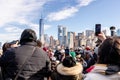 Tourists taking photos of Manhattan on a ferry from Manhattan to the Statue of Liberty Royalty Free Stock Photo