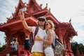 Tourists taking photos at temple on koh samui thailand Royalty Free Stock Photo