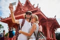 Tourists taking photos at temple on koh samui thailand Royalty Free Stock Photo