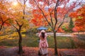 Tourists taking pictures in Colorful autumn with beautiful leaf at Baekyangsa temple in Naejangsan national park, South Korea Royalty Free Stock Photo