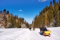 Tourists taking a ride in horse-drawn sledge