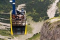 Tourists on top of gondola in the upper station of the Dachstein cable car on August 17, 2017 in Ramsau am Dachstein, Austria.