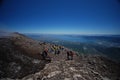 Tourists on top of volcano Royalty Free Stock Photo