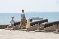 Tourists tour the stone town of Zanzibar.