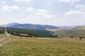 Tourists traveling on Bucegi plateau Royalty Free Stock Photo