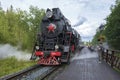 Tourists at the tourist retro train `Ruskeala Express`