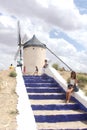Tourists at a traditional Spanish windmill in Consuegra, La Mancha, Spain Royalty Free Stock Photo
