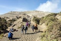 Tourists travel on the path to Mount Bromo crater Royalty Free Stock Photo