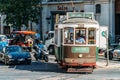 Tourists Travel By Tram 28 In Downtown Lisbon City