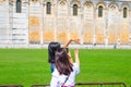 Tourists traveler asian chinese, japanese female women girls are posing, having fun, make stereotypical photos