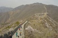 Tourists on the Chinese wall through mountains close to Beijing, China, Asia.