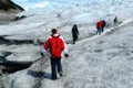 Tourists trekking on Perito Moreno Glacier