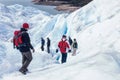 Tourists trekking on Perito Moreno Glacier