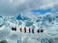 Tourists trekking on Perito Moreno Glacier in Patagonia, Argentina