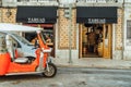 Tourists In Tuk Tuk Vehicles Visiting Major Attractions Downtown Lisboa City Royalty Free Stock Photo