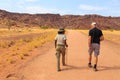 Tourists in Twyfelfontein, site of ancient rock engravings in the Kunene Region of north-western Namibia