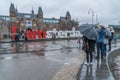 Tourist in rain Amsterdam