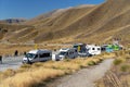 TOURISTS IN VEHICLES AT LINDIS PASS, NEW ZEALAND Royalty Free Stock Photo