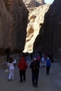 Tourists view the canyon ancient city of Petra in Jordan