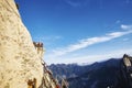 Tourists on a view point above the Plank Road in the Sky, worlds most dangerous hike.