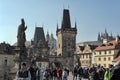 Tourists view Prague from Charles Bridge