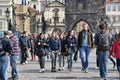 Tourists view Prague from Charles Bridge