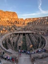 Tourists view Roman Colosseum from inside