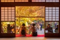 Tourists viewing beautiful Maple leaf in Japanese Garden at Enkoji temple, Kyoto, Japan. Landmark and famous in autumn season