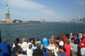 Tourists viewing Statue of Liberty