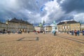 Tourists visit the Amalienborg Palace, Sculpture of Frederik V on Horseback, and Frederik`s Church in Copenha