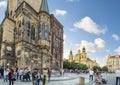 Tourists visit the Astronomical Clock and The Church of Saint Nicholas in Old Town Square in Prague Czechia