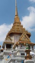 Tourists visit Bangkok temple Wat Traimit