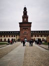 Tourists visit Castello Sforzesco in Milan, Italy Royalty Free Stock Photo
