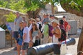 Tourists visit the city inside the mythical castle of Monemvasia Royalty Free Stock Photo