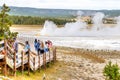 Tourists visit Clepsydra Geyser at Yellowstone National Park