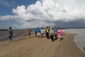Tourists visit Golden Scale Dragon Spine Beach