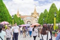 Tourists visit the Grand Palace in Bangkok, Thailand.