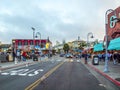 Tourists visit the harbor area in San Francisco at fishermans wharf Royalty Free Stock Photo