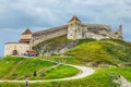 Tourists visit the medieval castle in Rasnov. Fortress was built between 1211 and 1225 Royalty Free Stock Photo