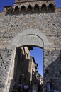 Tourists visit the Medieval San Gimignano hilltop town. Tuscany region. Italy Royalty Free Stock Photo