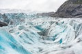Tourists visit the Nigardsbreen Glacier, an arm of the Jostedalsbreen glacier, Jostedalsbreen National Park