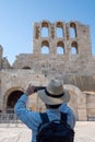 Tourists visit the Odeon of Herodes Atticus in Athens