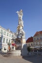 Tourists visit the Plague Column in Baden, Austria.