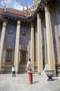 Tourists visit to Wat Phra Kaew or the Temple of the Emerald Buddha inside Grand Palace, Bangkok Royalty Free Stock Photo