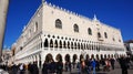 Tourists visit Venice waterfront near St Marco Square in Venice