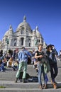 Tourists visiting the Basilica of the Sacred Heart of Paris