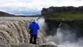 Tourists visiting Dettifoss, the most powerful waterfall in Iceland