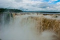 Tourists visiting the Devil s throat waterfall in the Iguazu Falls, one of the seven natural wonders of the world. Missions, Royalty Free Stock Photo