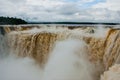 Tourists visiting the Devil s throat waterfall in the Iguazu Falls, one of the seven natural wonders of the world. Missions, Royalty Free Stock Photo