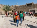 Tourists visiting Dubai Museum in Al Fahidi Fort courtyard